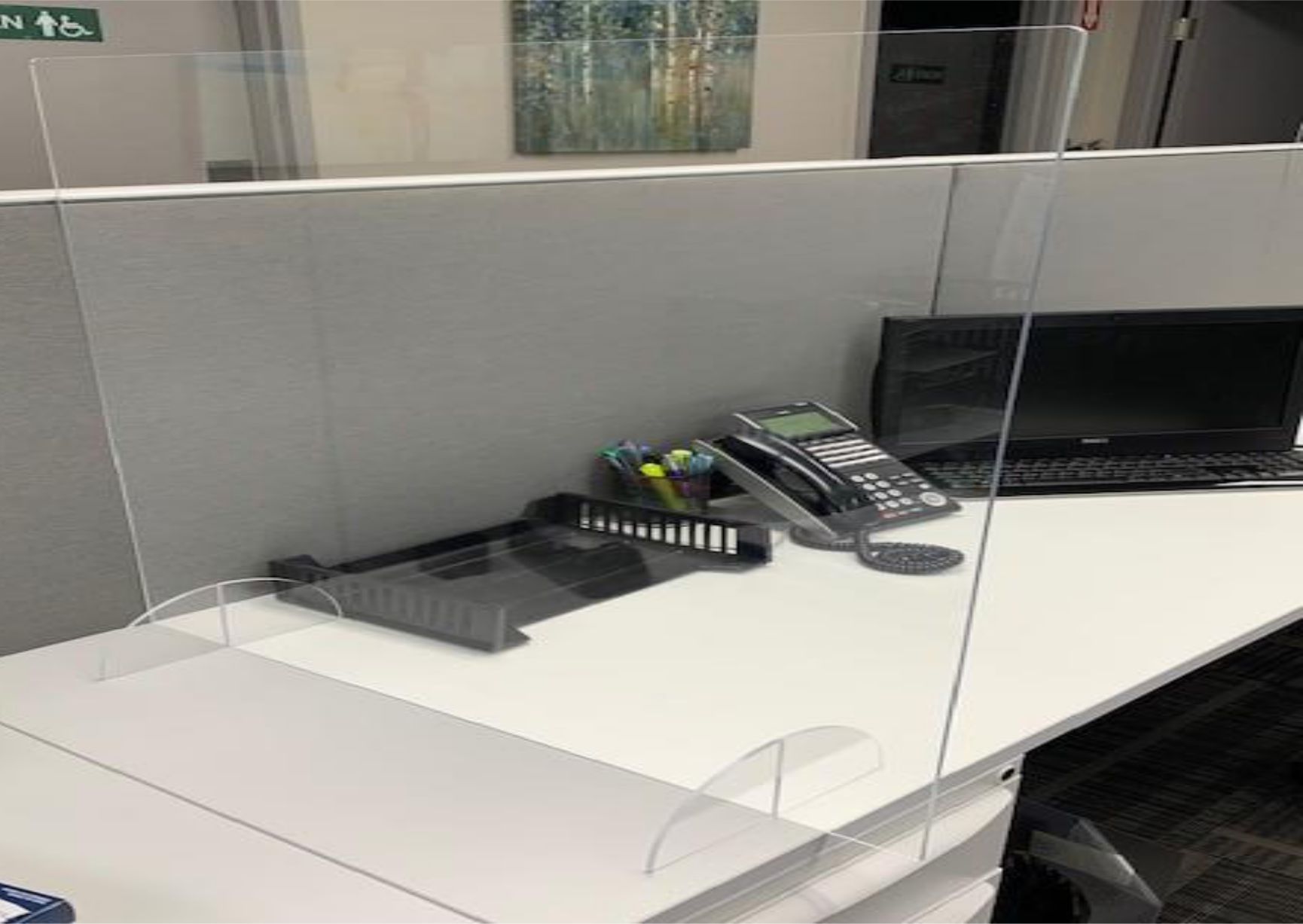 Office Desk With Laptop and Phone