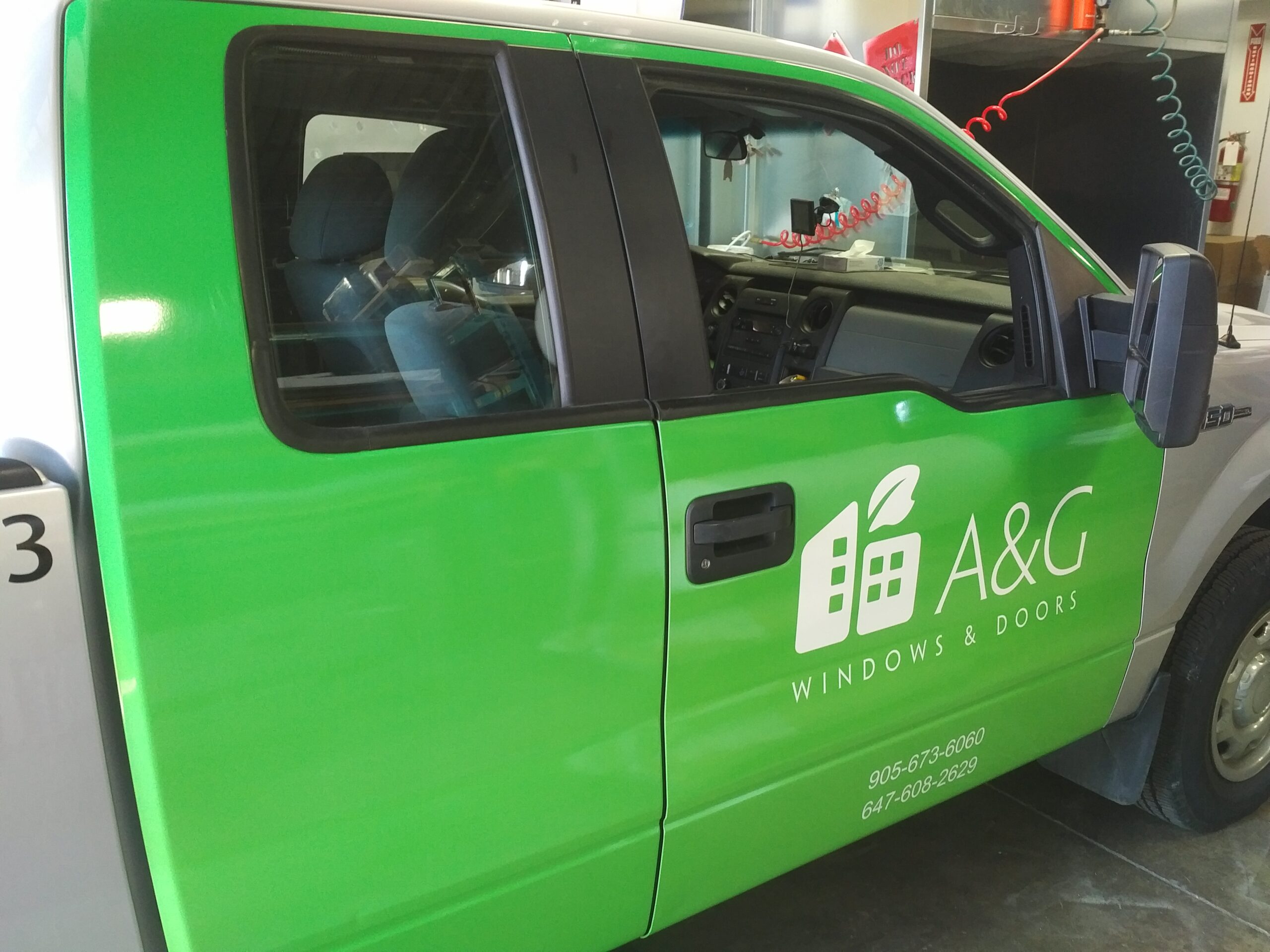 A and G Windows and Doors Graphic on a Pickup